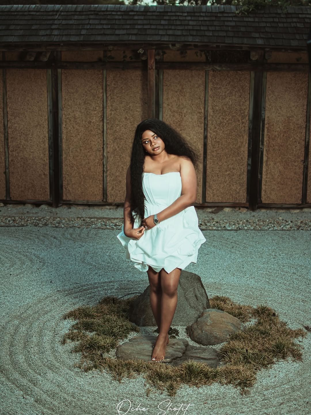 Portrait in white dress, zen garden