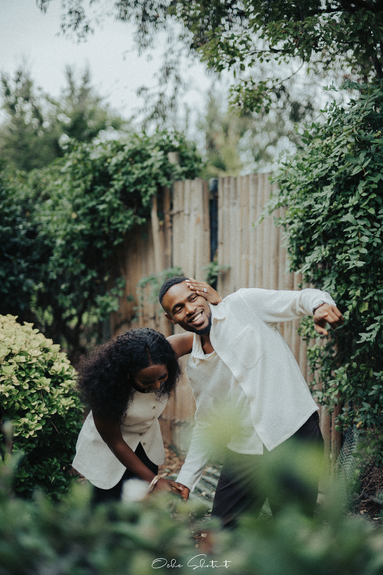 Couple playful in garden